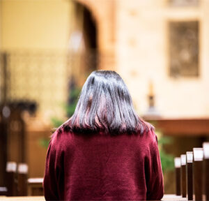 Lady attending Holy Hour with Jesus